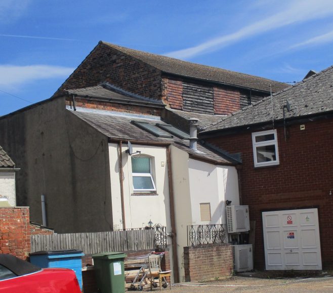 Rear view showing part of the clerestory. The newer building on the right is where the Sunday school stood. | D Secker